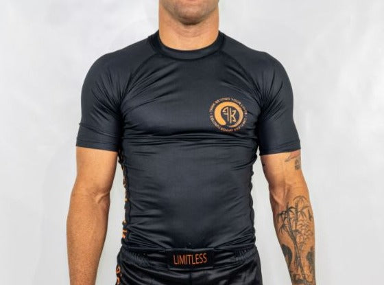 LIMITLESS S/S MEN'S RASH GUARD - BLACK/ORANGE