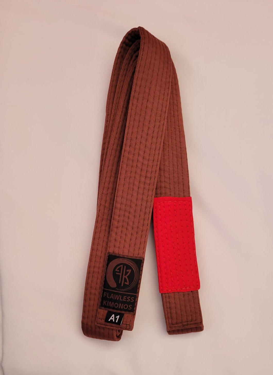 FLAWLESS INSTRUCTORS BROWN BELT W/RED BAR